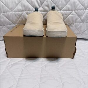 Toms Slip-On Canvas Flats in Off-White